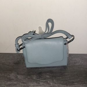 Powder blue cross body purse leather